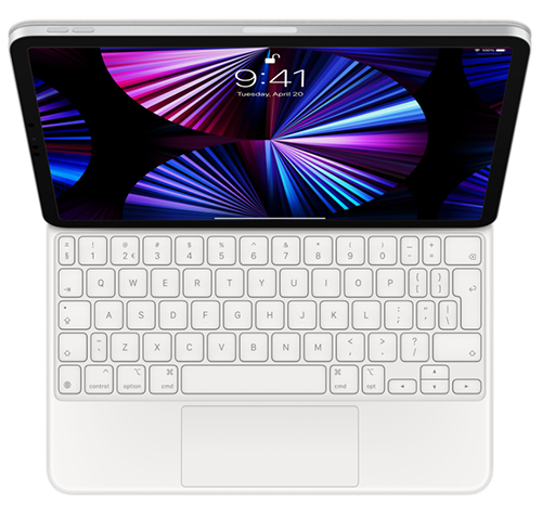 A tablet with a keyboard attached is open, showing a colorful background. The keyboard is white.