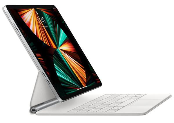 Tablet with keyboard: a silver tablet with a white keyboard attached, angled upwards.