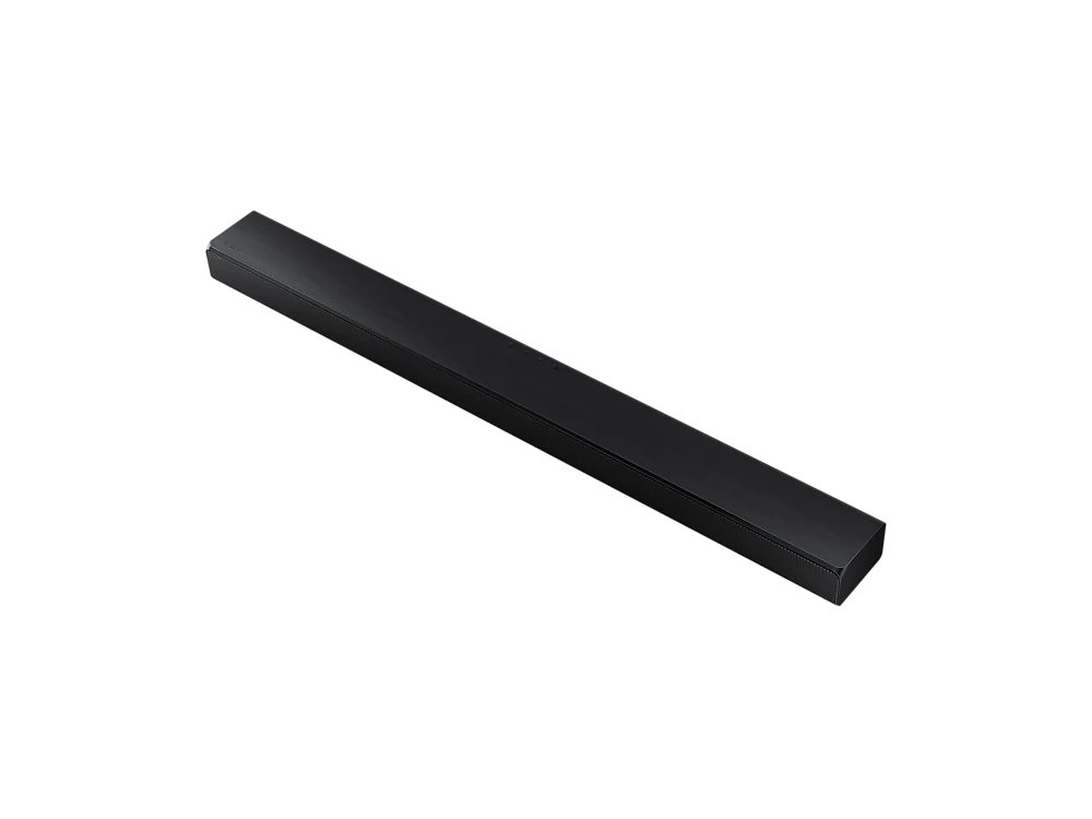 Una barra de sonido negra, de forma rectangular, sobre un fondo negro, ligeramente inclinada desde arriba.
