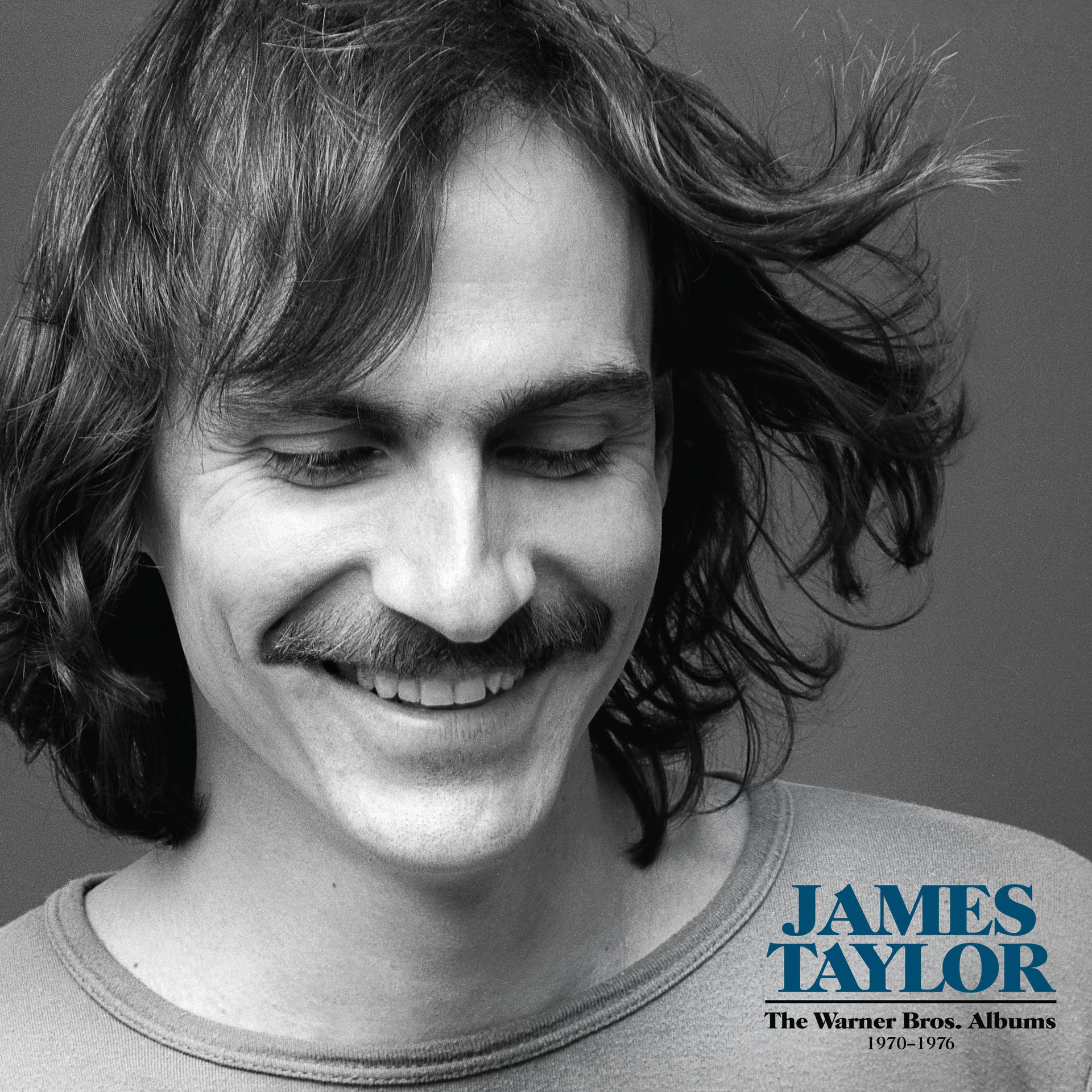 James Taylor lächelt, dunkles Haar, Schnurrbart, Albumcover.