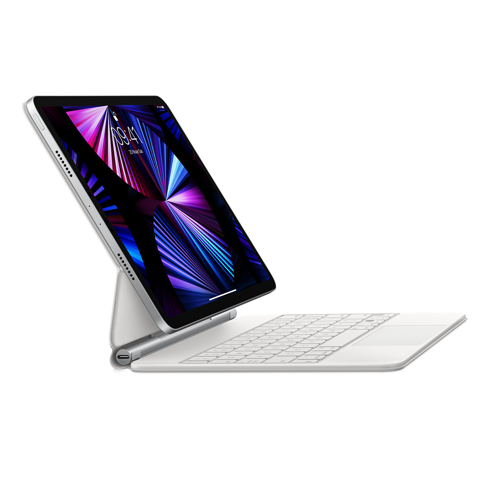 Klavye standlı tablet. Ekran saat ve renkli bir görüntü gösteriyor.