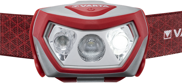 Stirnlampe mit drei hellen Lichtern. Rotes und graues Gehäuse. VARTA-Branding oben.