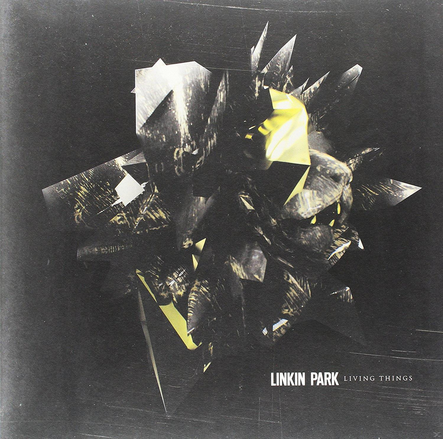 Absztrakt albumművészet szaggatott formákkal és a 'LINKIN PARK' és 'LIVING THINGS' szavakkal.
