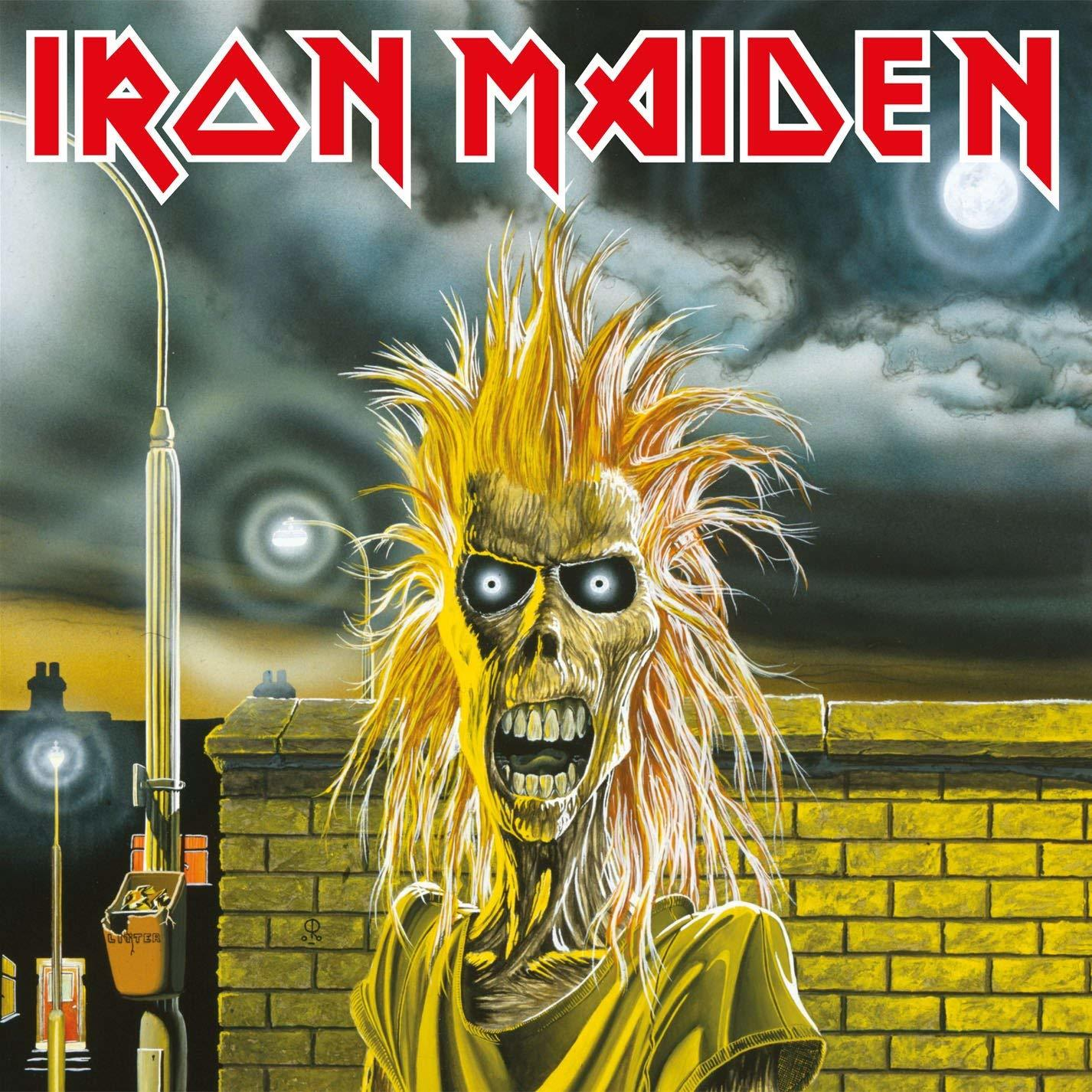 Az Iron Maiden album borítója. Egy zombiszerű figura sárga hajjal egy téglafal előtt áll.