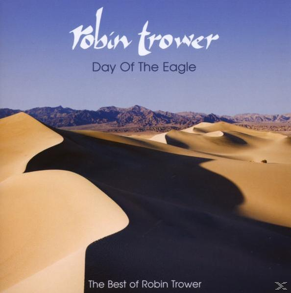 Robin Trower Day Of The Eagle albumjának borítója homokdűnékkel és kék éggel.