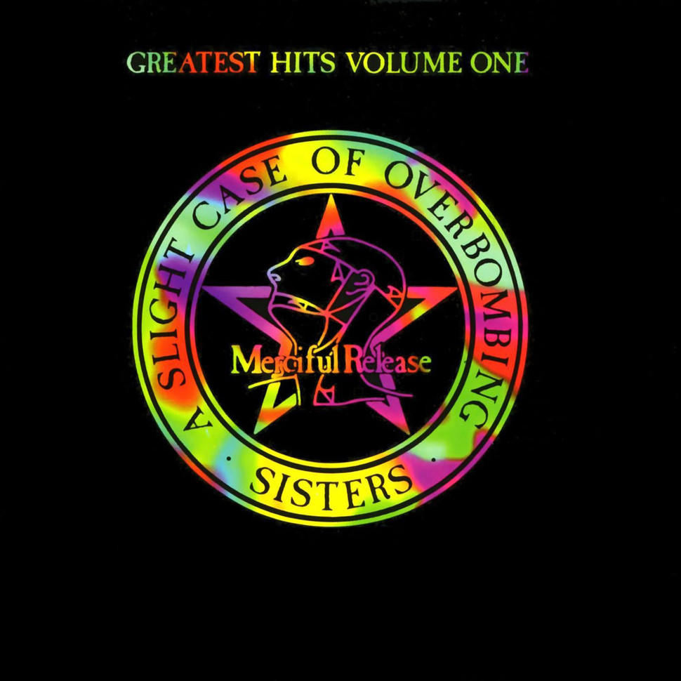 Album borító: 'Greatest Hits Volume One' a The Sisters of Mercy-től. Egy kör alakú embléma csillaggal és arc körvonallal.