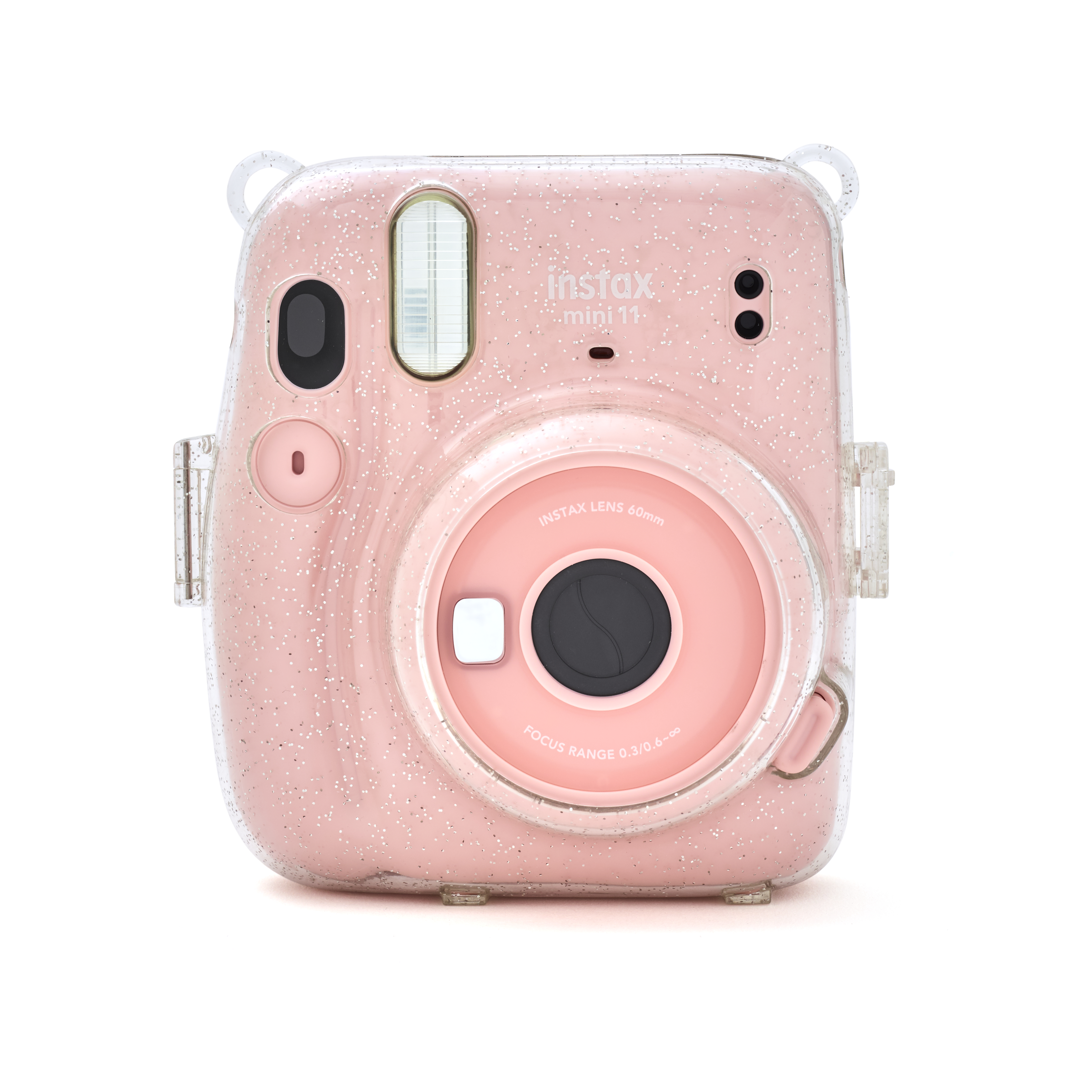 Pinke Instax Mini 11 Kamera in einer durchsichtigen Glitzerhülle auf weißem Grund.