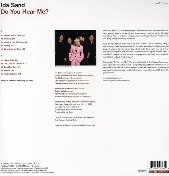CD-Cover mit Bandfotos, Text und einem Text über ein Album.