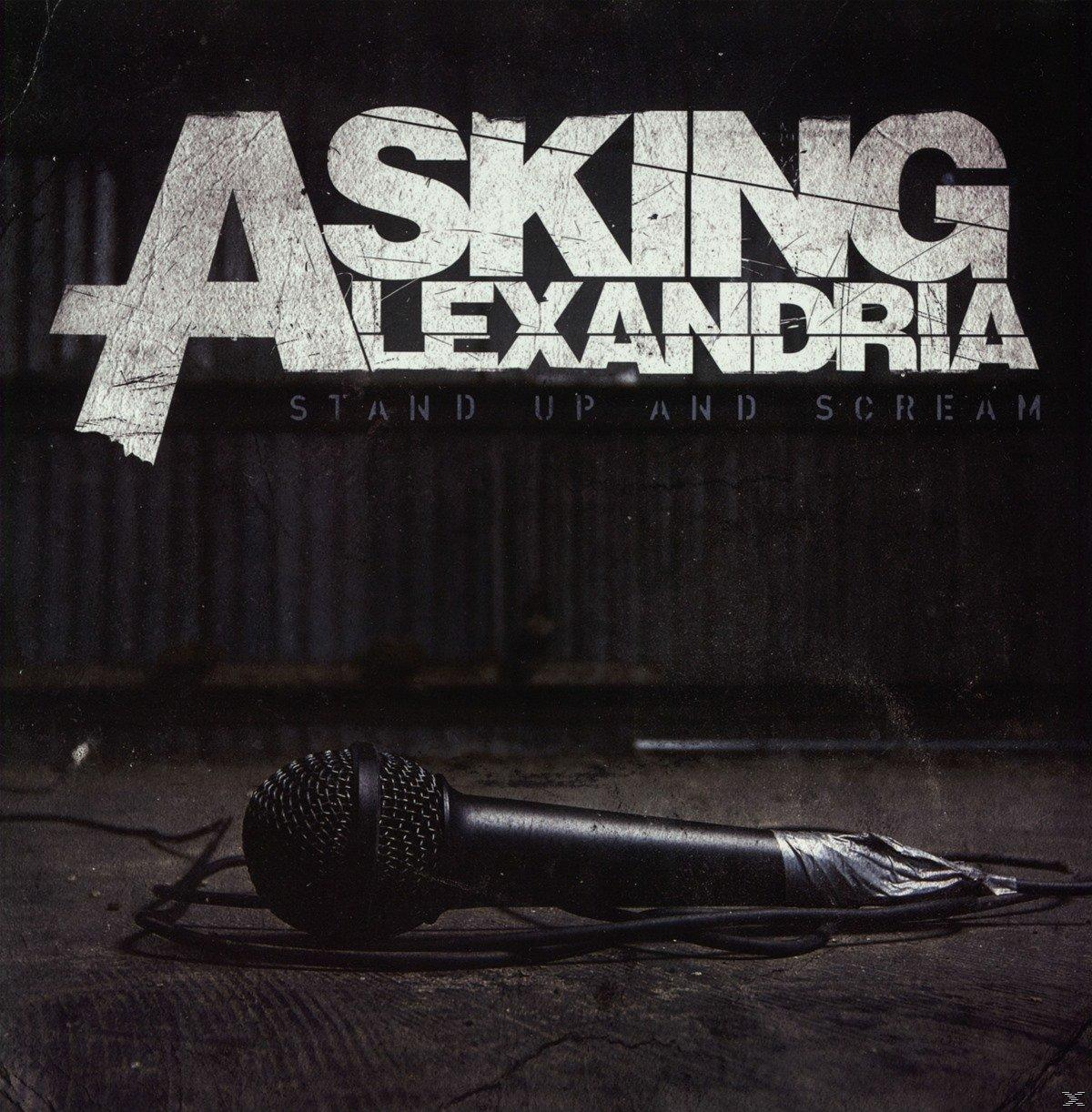 Fekete mikrofon szalaggal a nyelén sötét padlón, felette az Asking Alexandria felirattal.