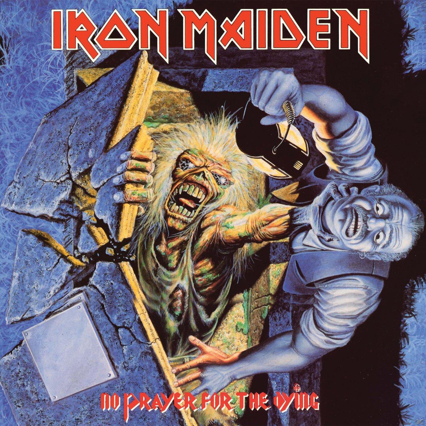 Iron Maiden album borító, szörny feltöri a sírt, férfi nyúl, sötétkék háttér.