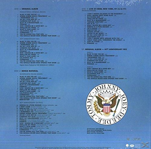 Album borítója számlistákkal, logóval és zenekari emblémával.