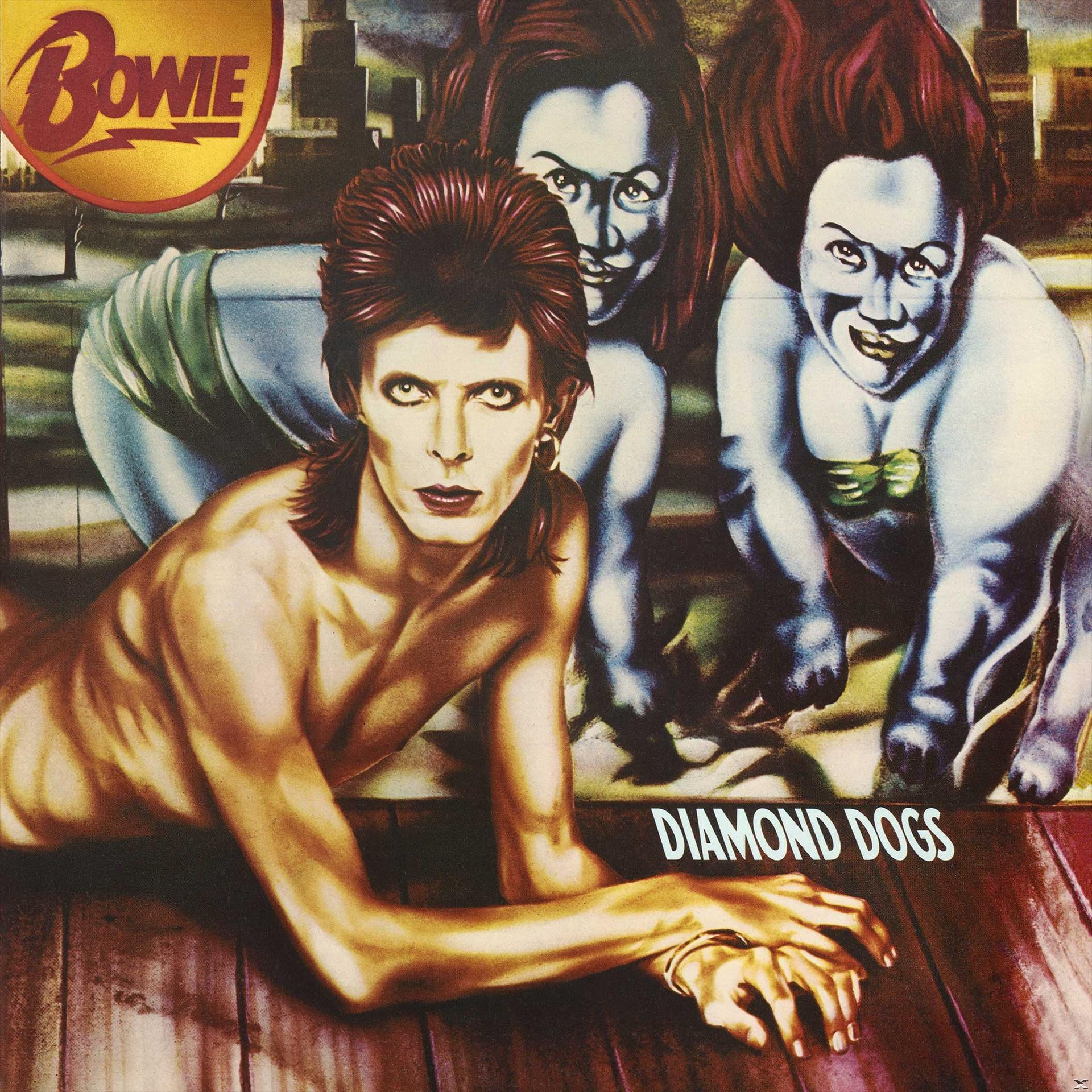 Album cover: David Bowie with two figures, title 'Diamond Dogs' on a wooden floor.