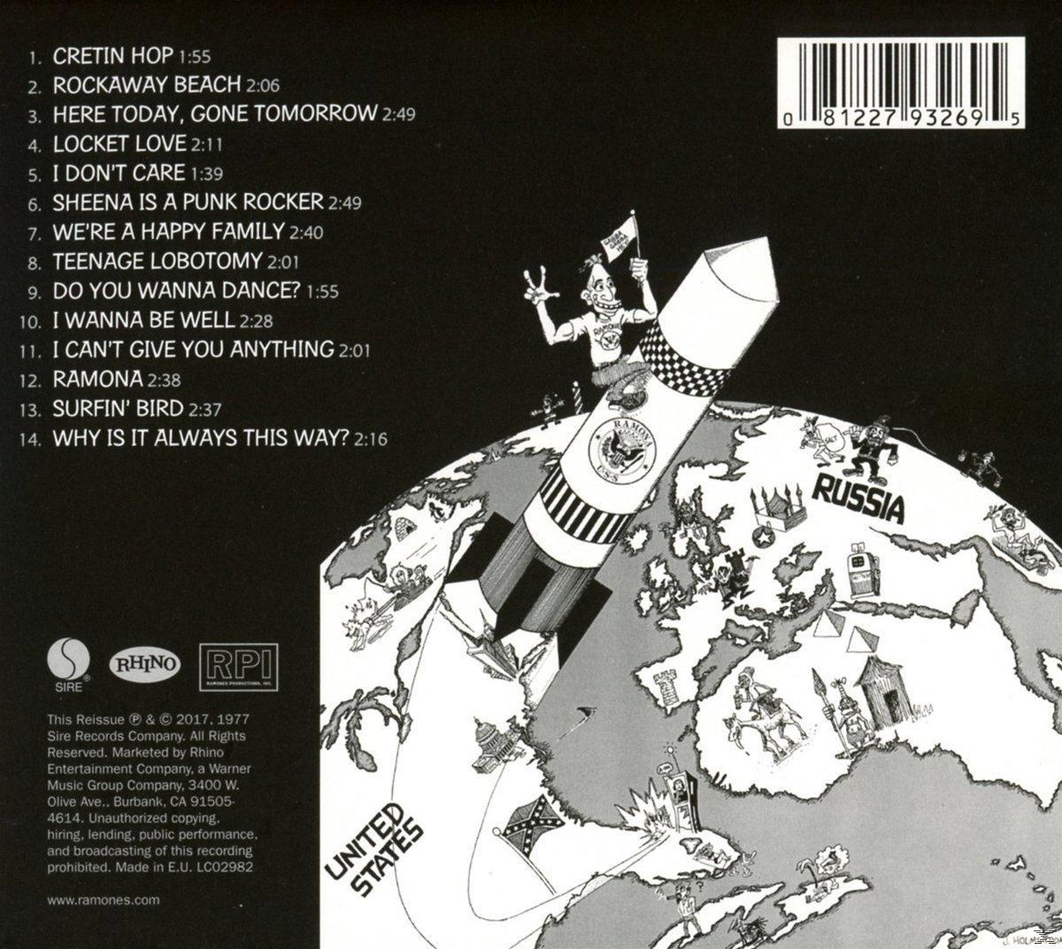 Album borító, amely egy rajzolt rakétát mutat a világtérképen a dalok címeivel.
