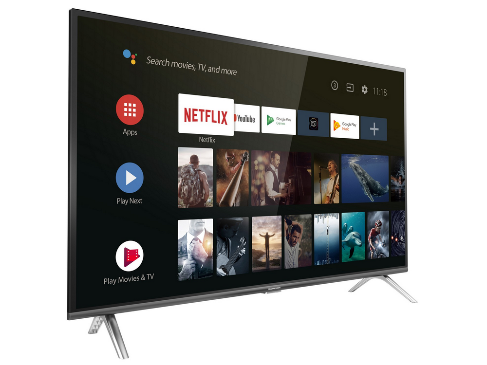 Un televisor inteligente que muestra aplicaciones y una pantalla de inicio. La pantalla muestra Netflix y otros servicios.
