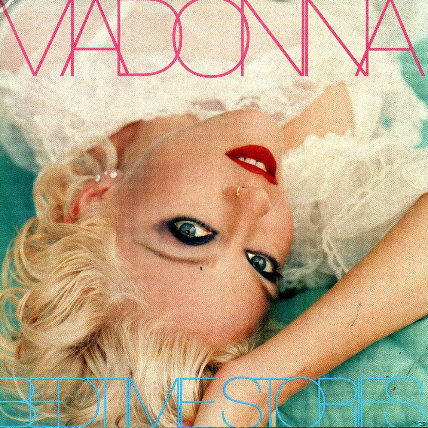 Madonna album borító: fejközelkép, szőke haj, piros rúzs és a szöveg: BEDTIME STORIES.