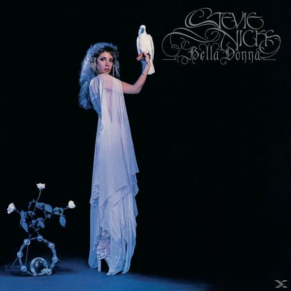 Stevie Nicks Albumcover mit ihr, die eine Taube hält. Weiße Rosen im Vordergrund, schwarzer Hintergrund mit Text.