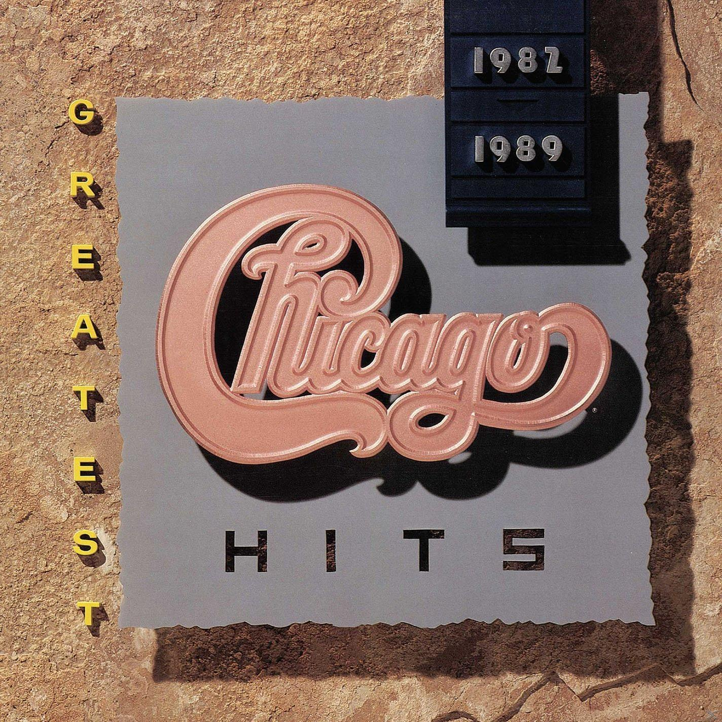 Albumcover, Chicago, Greatest Hits, Logo, Text, Schwarz und Gold, auf Stein.