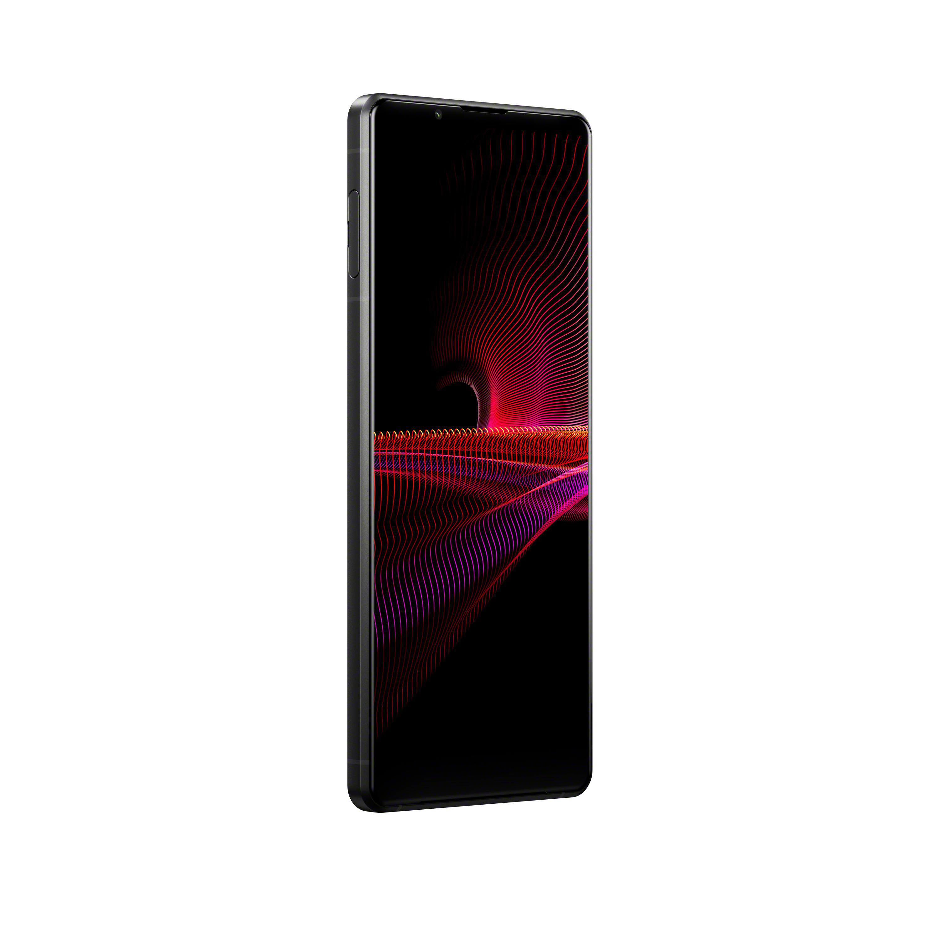 Schwarzes Smartphone mit rotem und violettem Design auf dem Bildschirm, weißer Hintergrund.