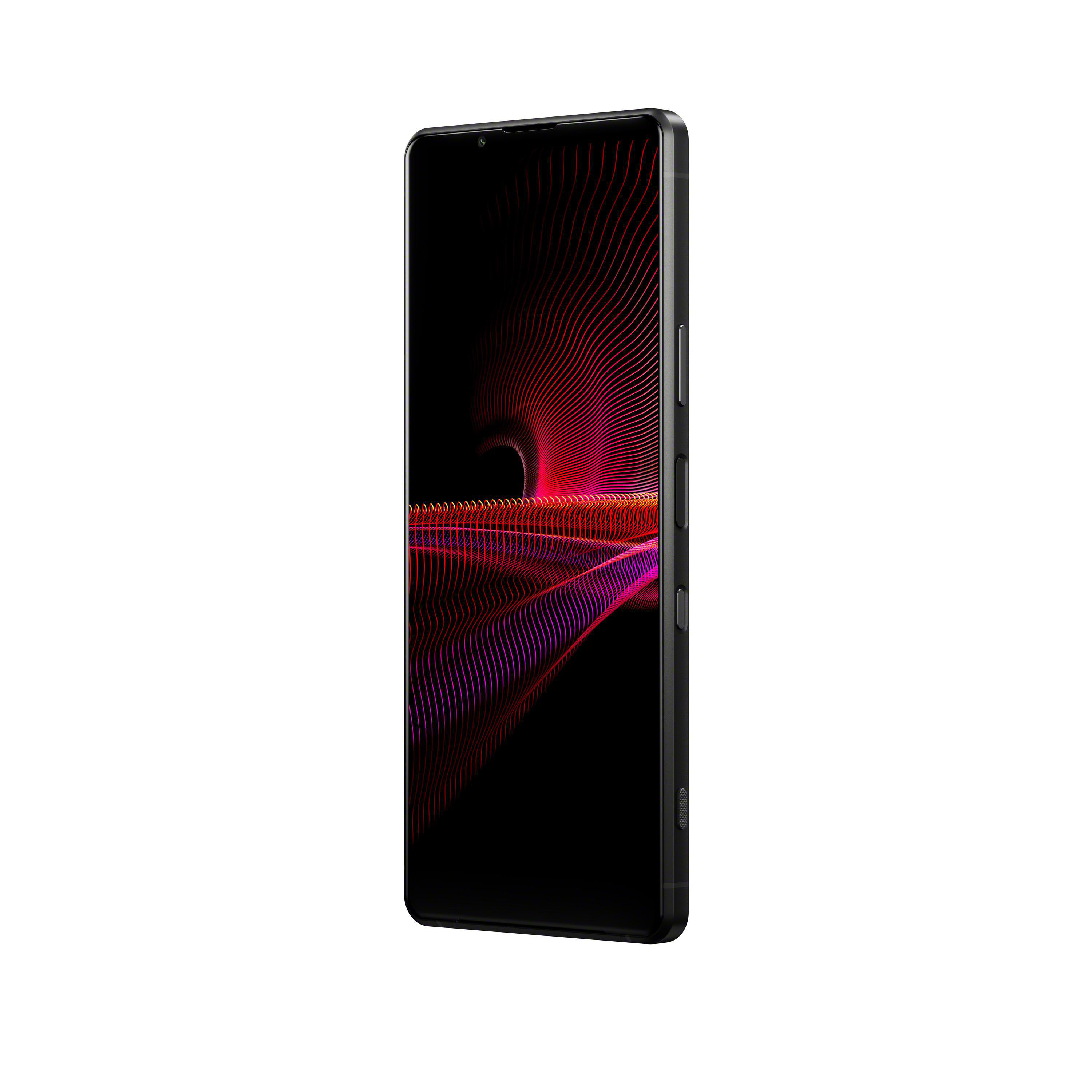 Schwarzes Smartphone mit rotem und lila Design auf dem Bildschirm.