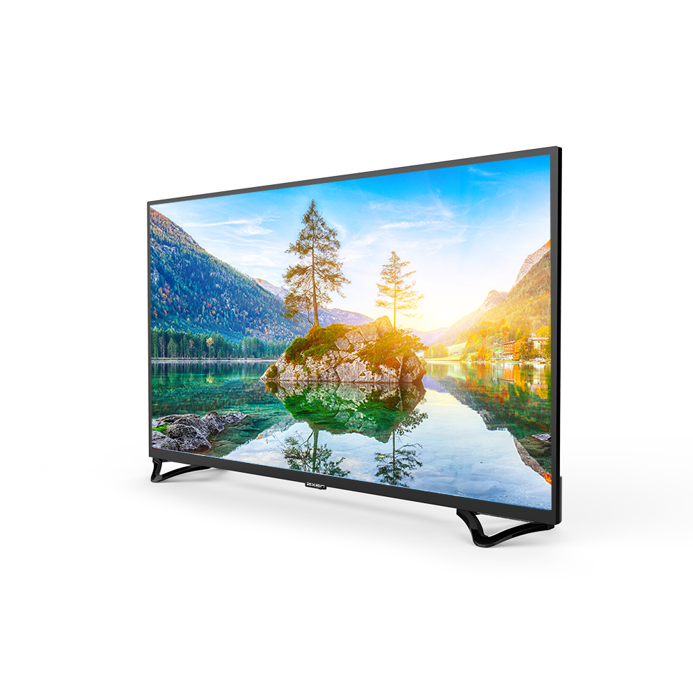 Düz ekran bir TV, dağlar, ağaçlar ve mavi gökyüzü ile manzaralı bir göl manzarası görüntülüyor. TV siyah, siyah ayaklı, beyaz bir arka plan üzerinde.