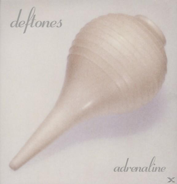 Deftones felirat világos bézs orrszívó felett.
