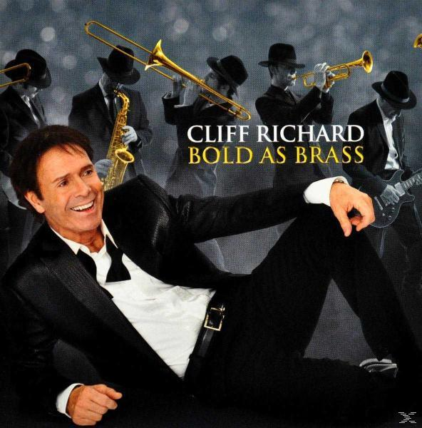 Album borító, Cliff Richard, mosolyog, fekete öltönyben, zenészekkel körülvéve.