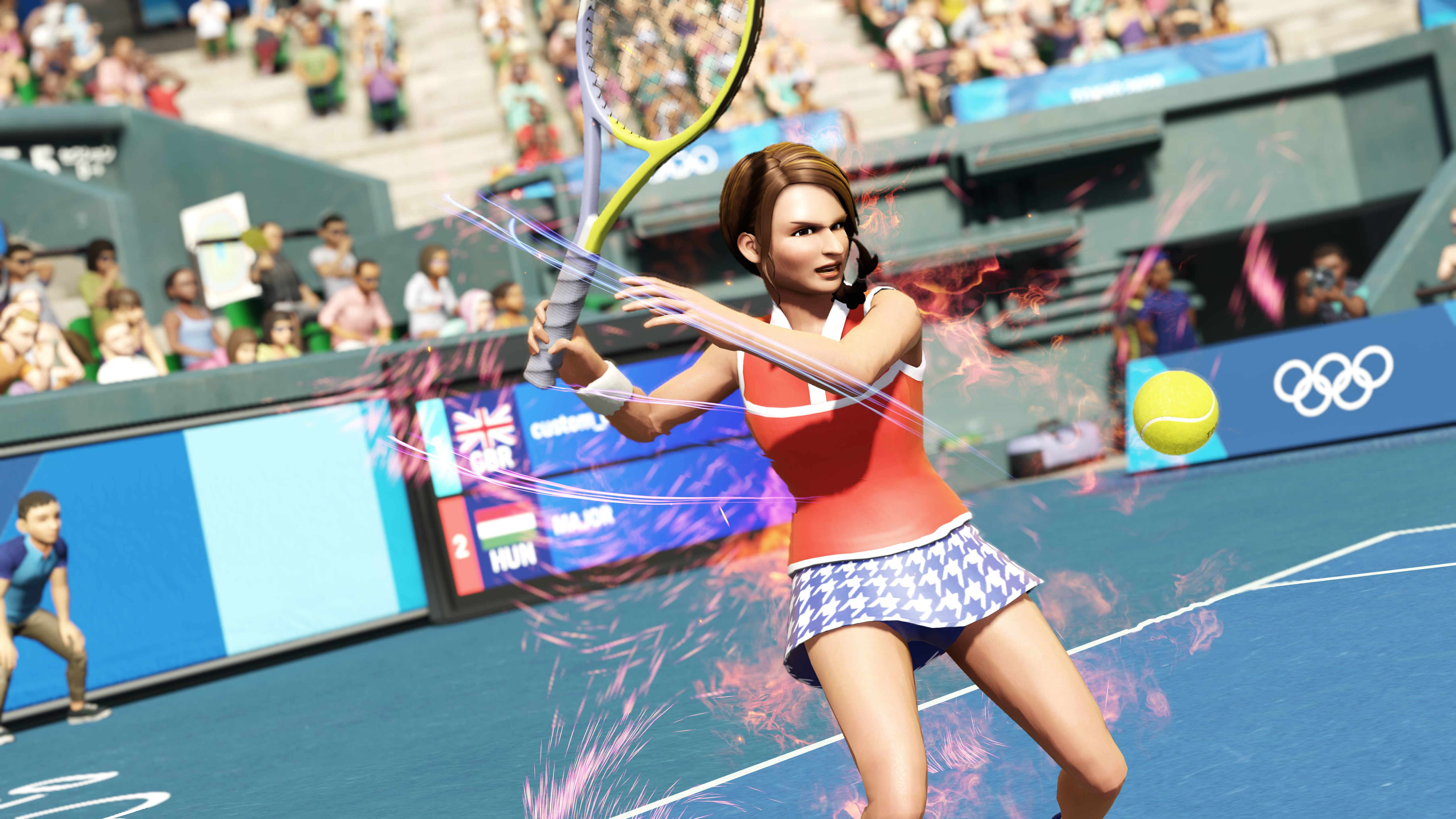 Giocatrice di tennis che colpisce una palla gialla durante una partita in uno stadio.