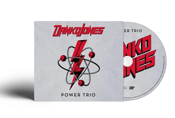 CD-Cover für das Album 'Power Trio' von Danko Jones, das ein Atom und einen Blitz zeigt.