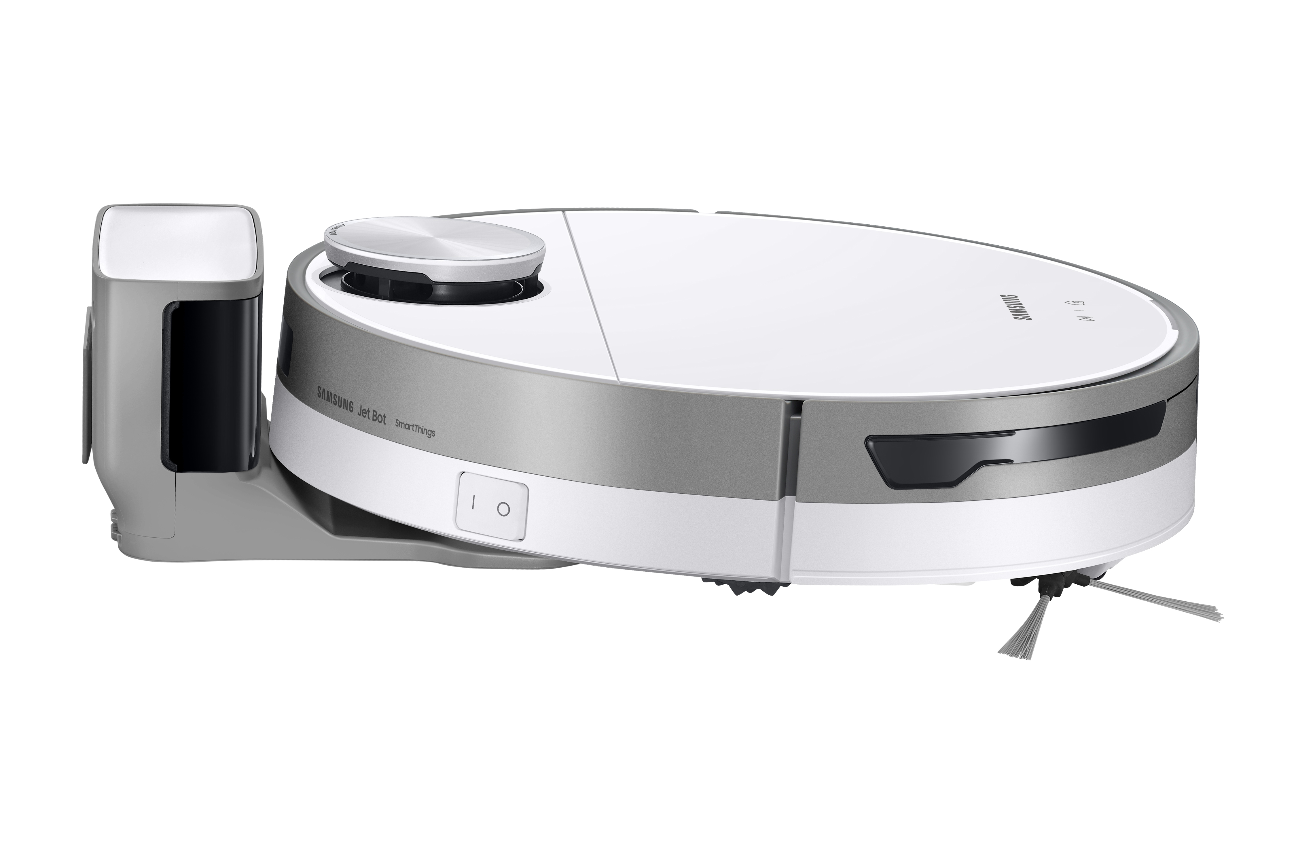 Aspirateur robot blanc et argenté avec station de recharge.