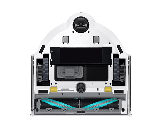 Aspirateur robot vu d'en bas, montrant les brosses et les roues.