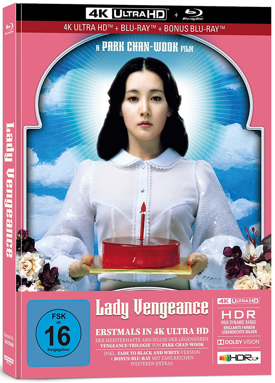 DVD-Cover von Lady Vengeance. Eine Frau hält einen Kuchen mit einer Kerze.