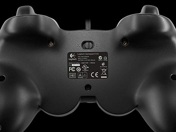 The back of a black Logitech gamepad. Shows the Logitech logo and model info.