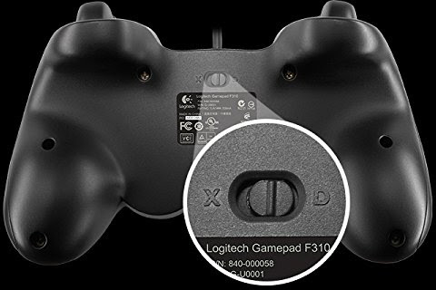 The back of a black Logitech gamepad with the X/D switch highlighted.