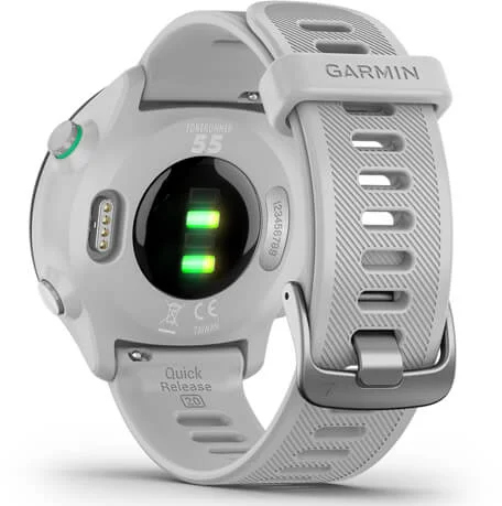 White Garmin Forerunner 55 watch, back view, with the strap open.