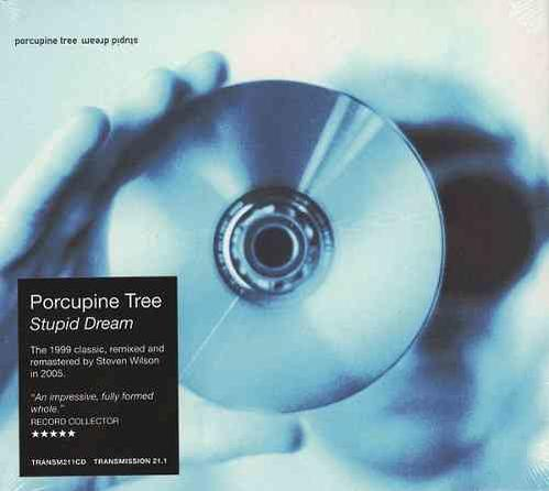 CD-Cover mit einer Hand, die eine CD hält, Text: Porcupine Tree, Stupid Dream und ein schwarzer Aufkleber.