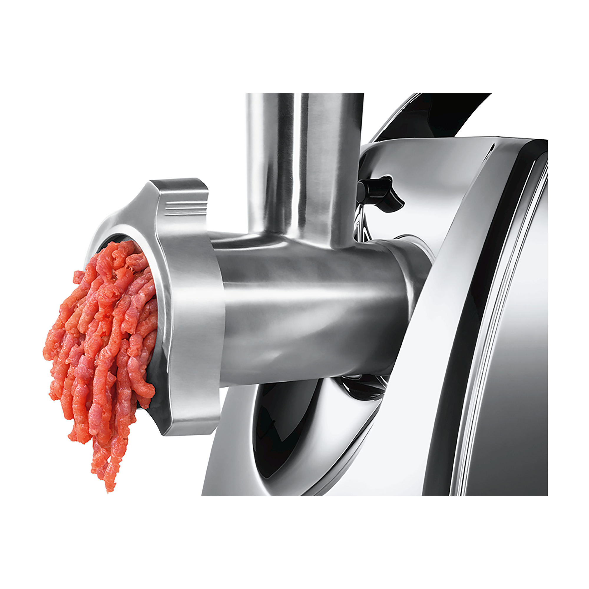 Un tritacarne in acciaio inox con carne macinata rossa che esce.