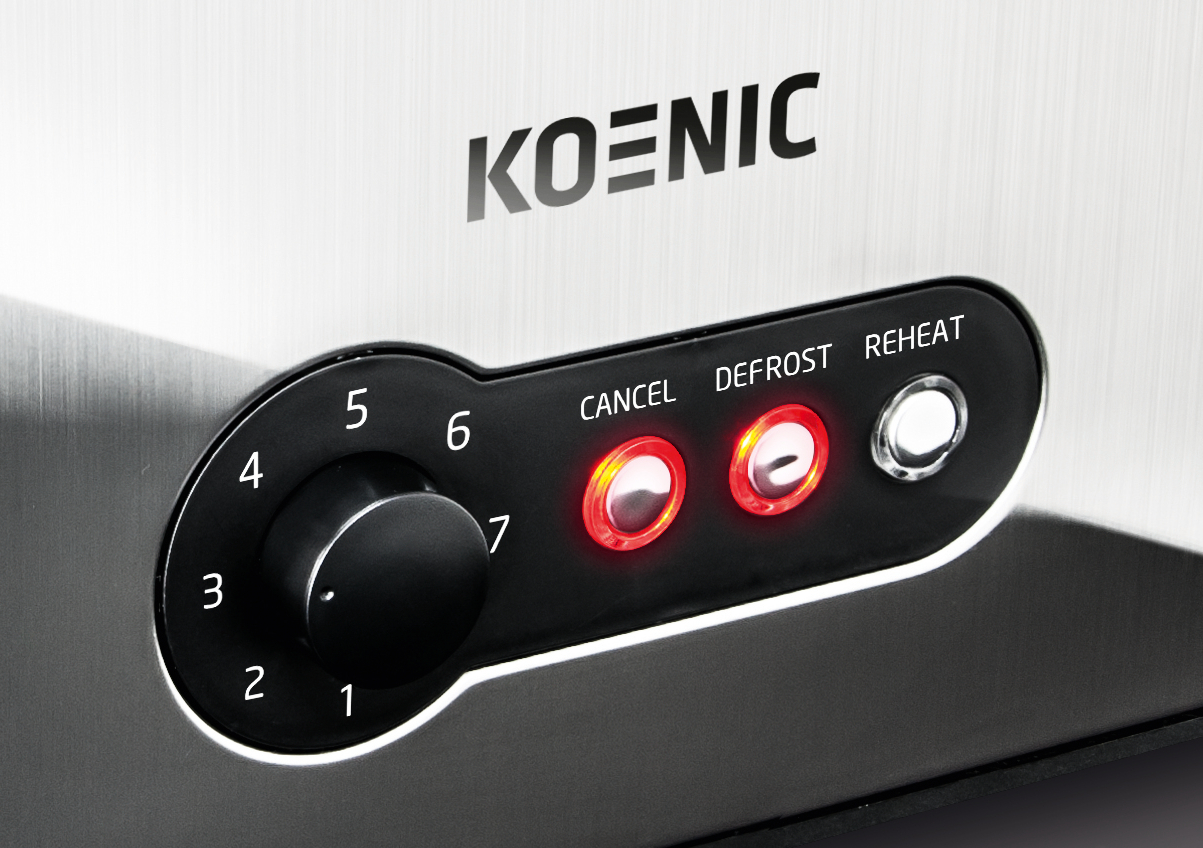Nahaufnahme eines Toaster-Bedienfelds. Es hat einen Drehregler und rot leuchtende Knöpfe.