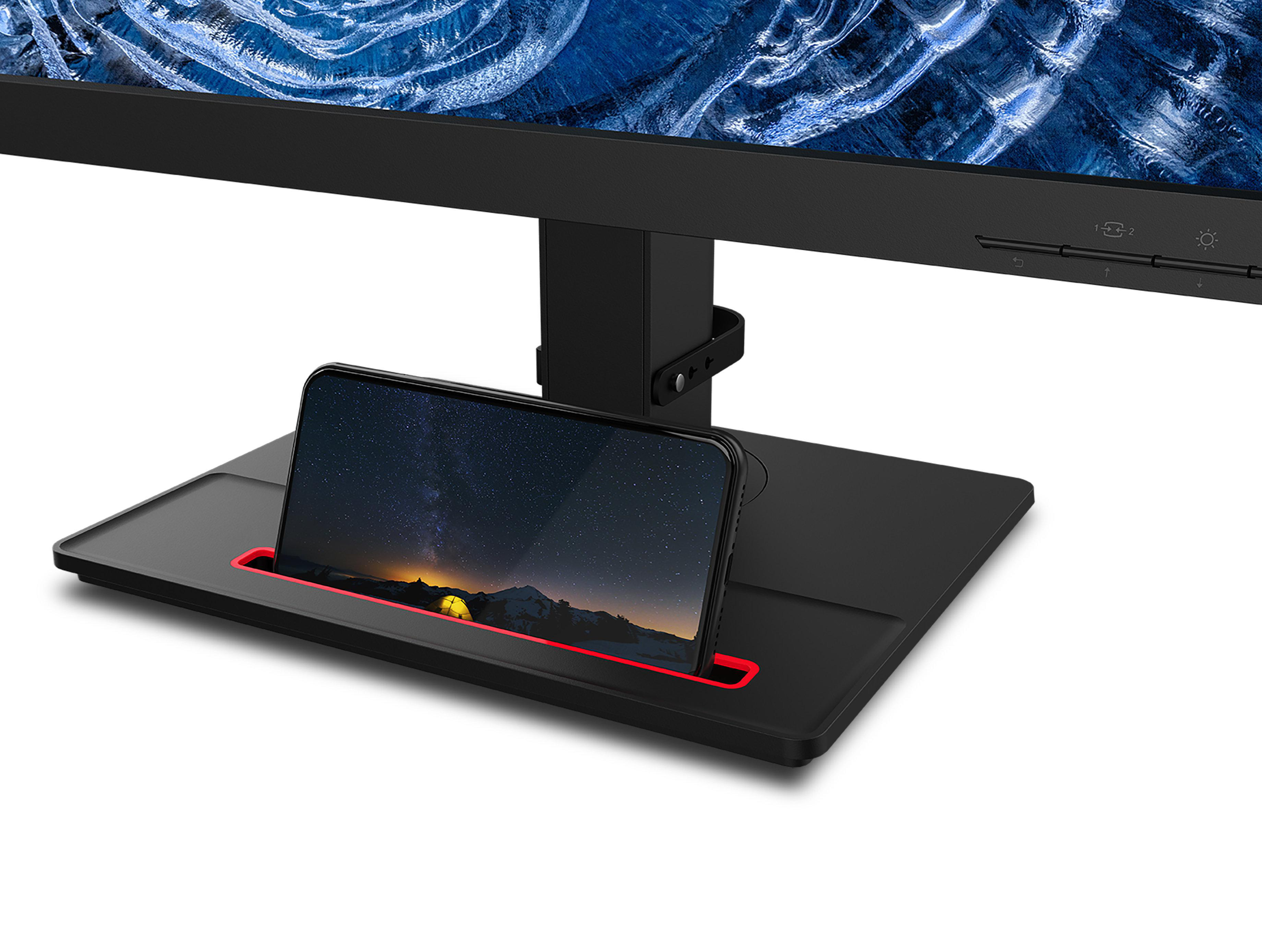 Monitor mit Telefon-Slot, Telefon zeigt eine Landschaft.