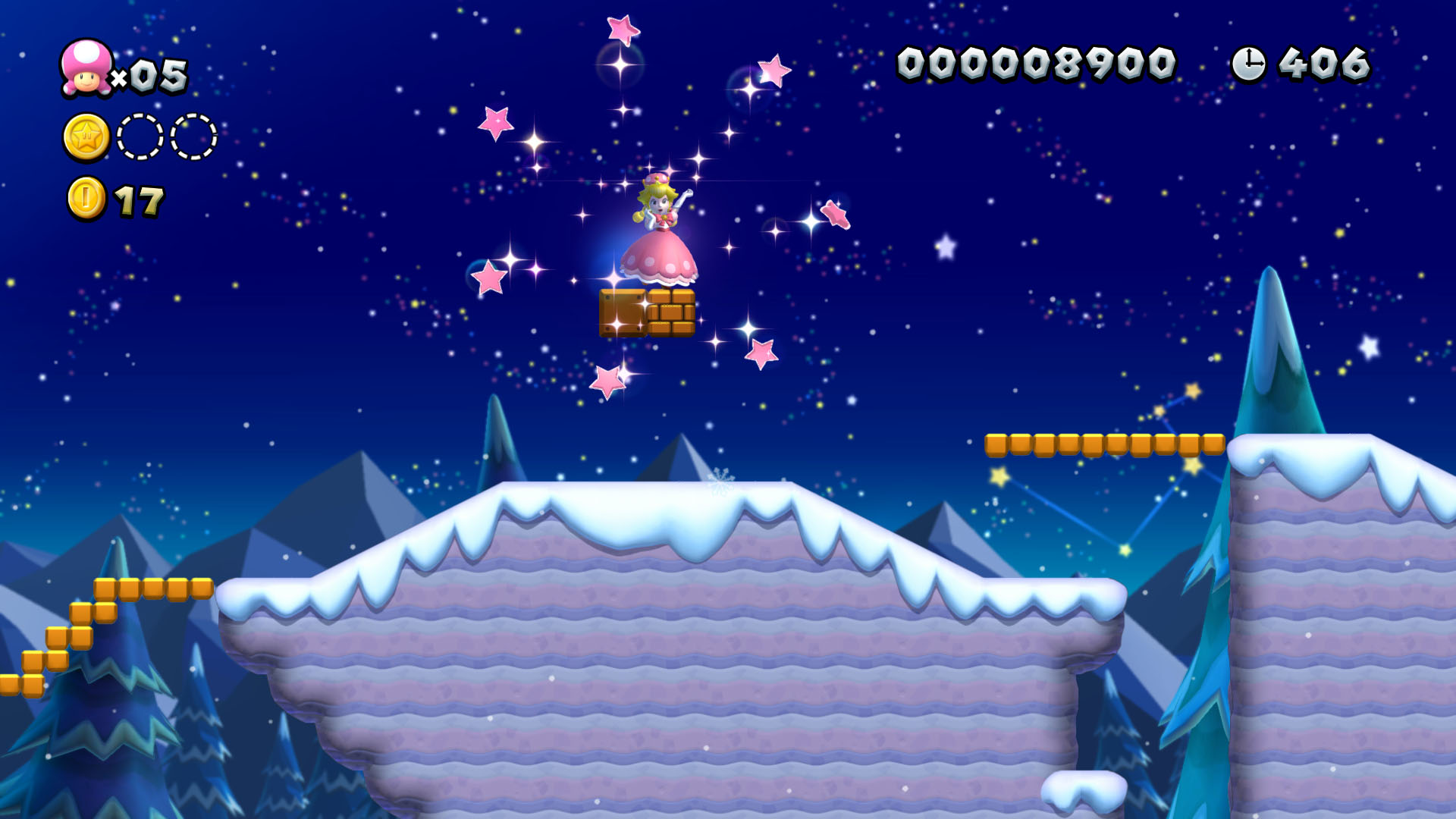 Principessa Peach su una piattaforma in un livello di Super Mario Bros, con stelle e cielo notturno.
