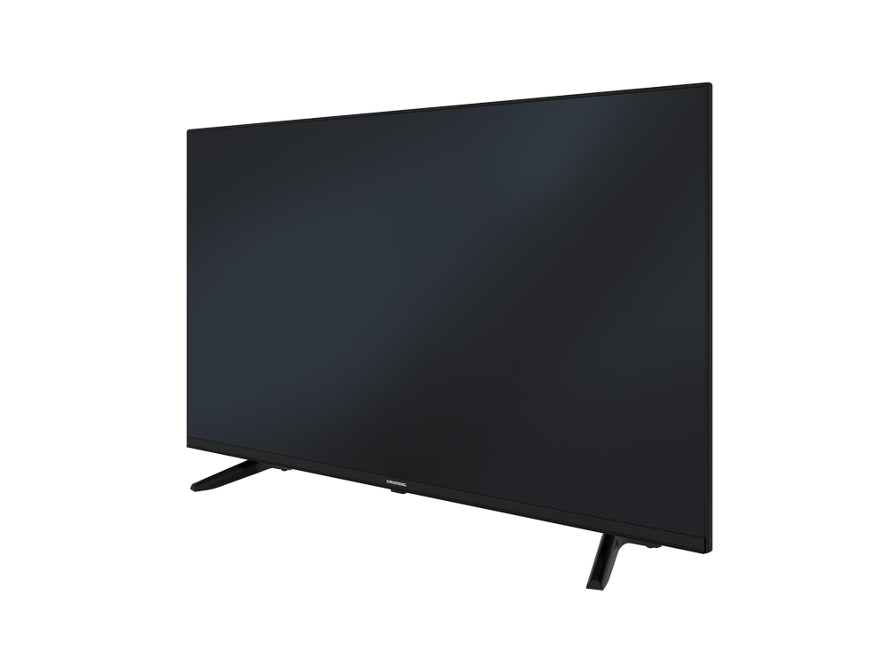 Televisor negro sobre un fondo negro. El televisor está en ángulo hacia la derecha.