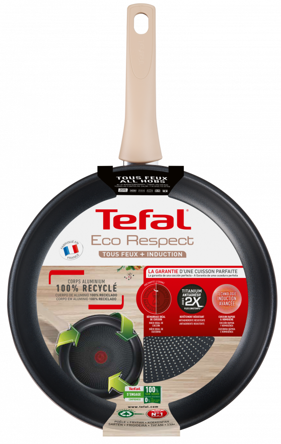 Black and black frying pan with a beige handle.