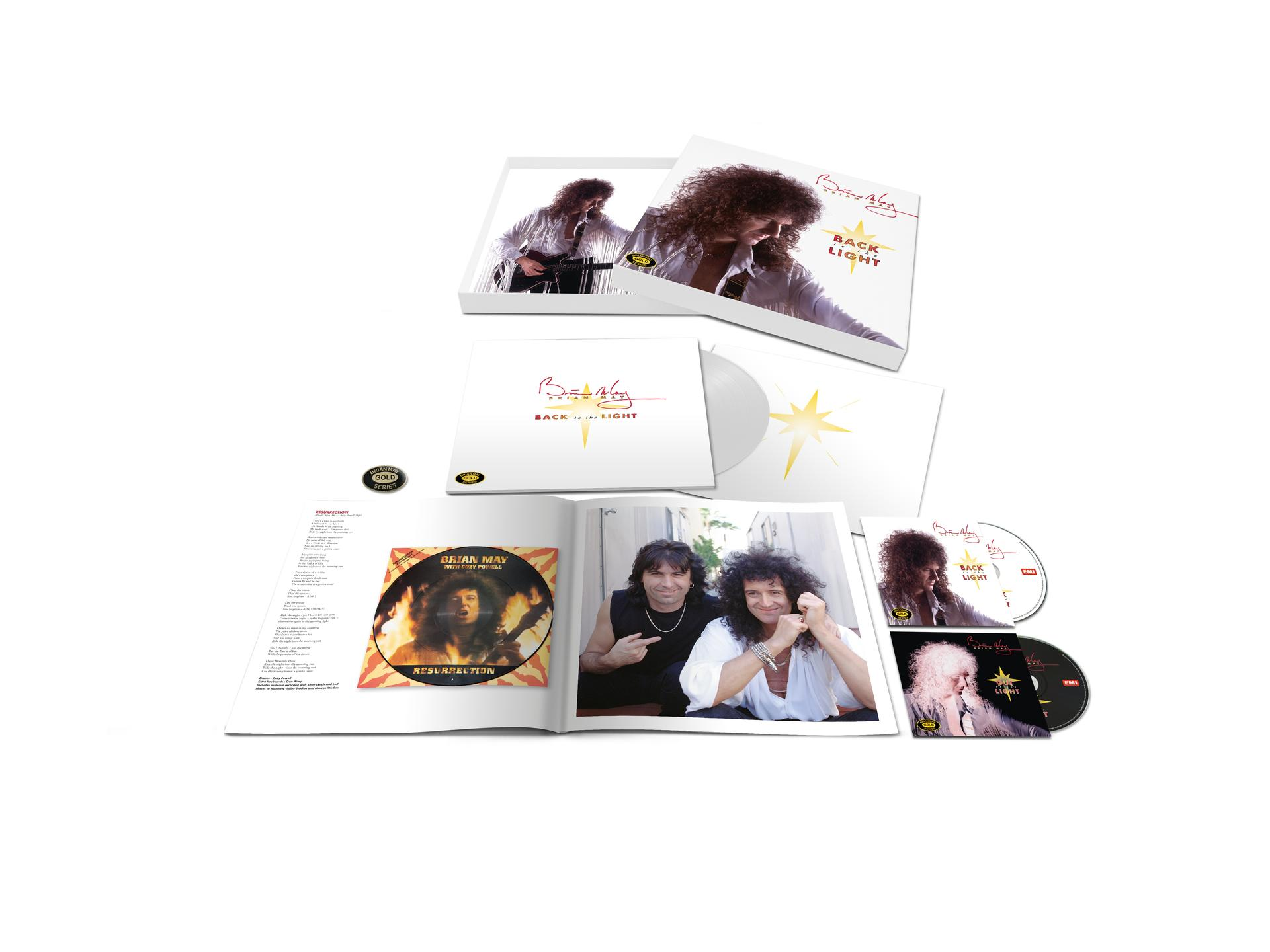Egy zenei album box setje borító grafikával és több lemezzel. A művész Brian May.