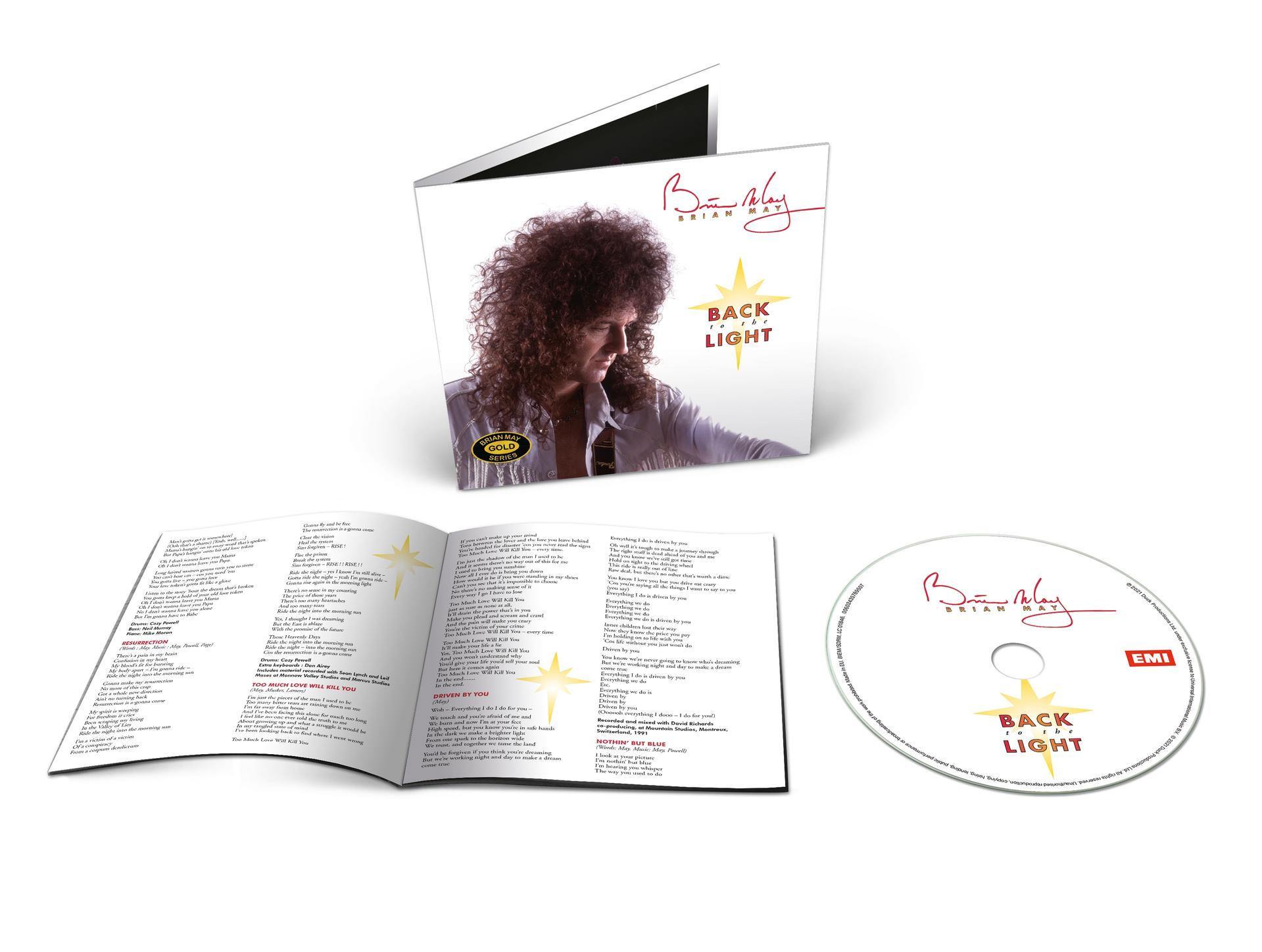 Brian May albuma nyitott füzettel és CD-vel.
