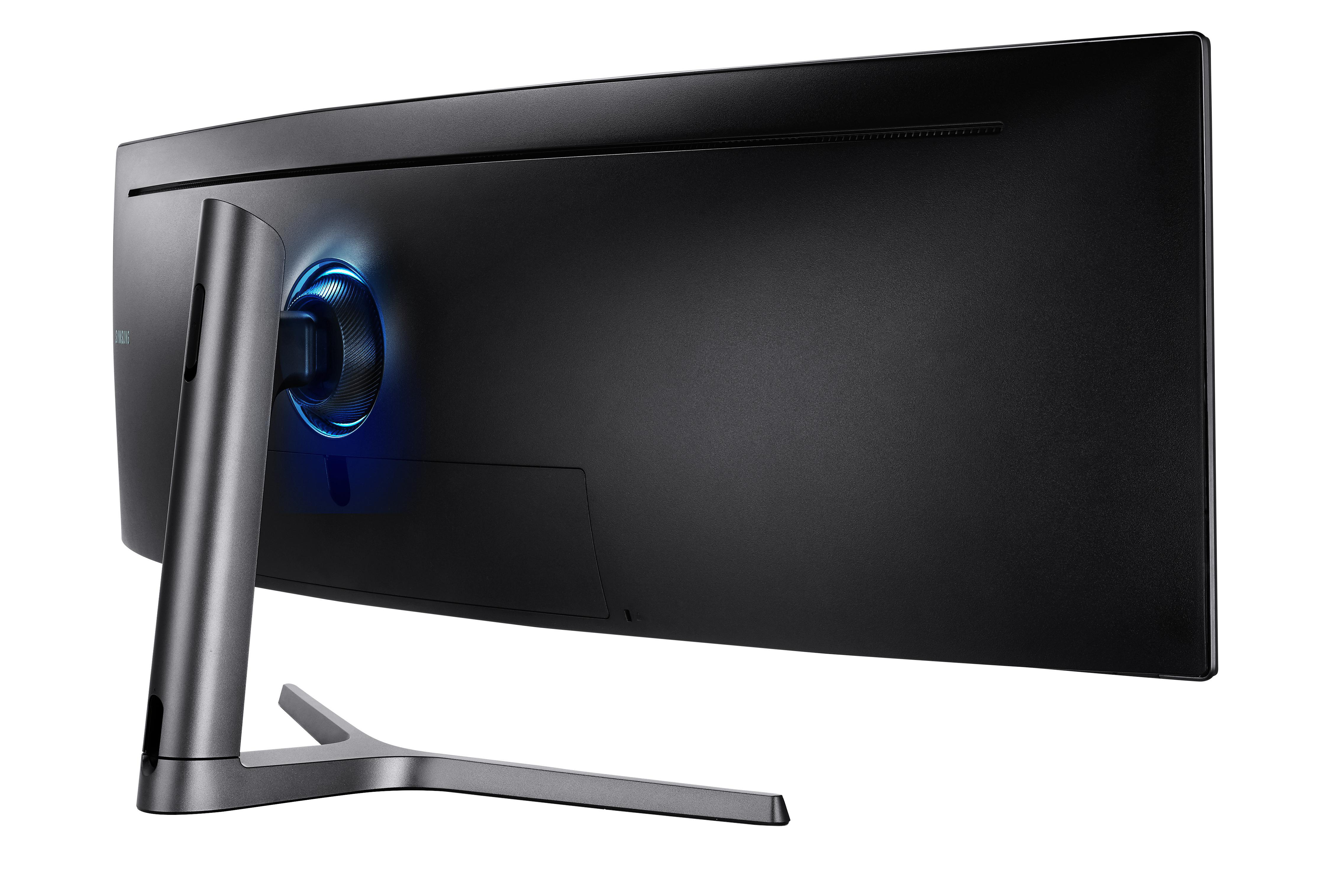 Ein geschwungener schwarzer Computermonitor von der Seite mit Ständer und blauen Lichtdetails.
