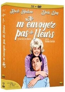 Movie cover with woman embracing man. Title in French, 'Ne m'envoyez pas de fleurs'.