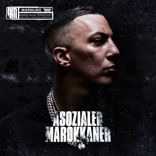 Albumcover mit Porträt eines Mannes und Text.