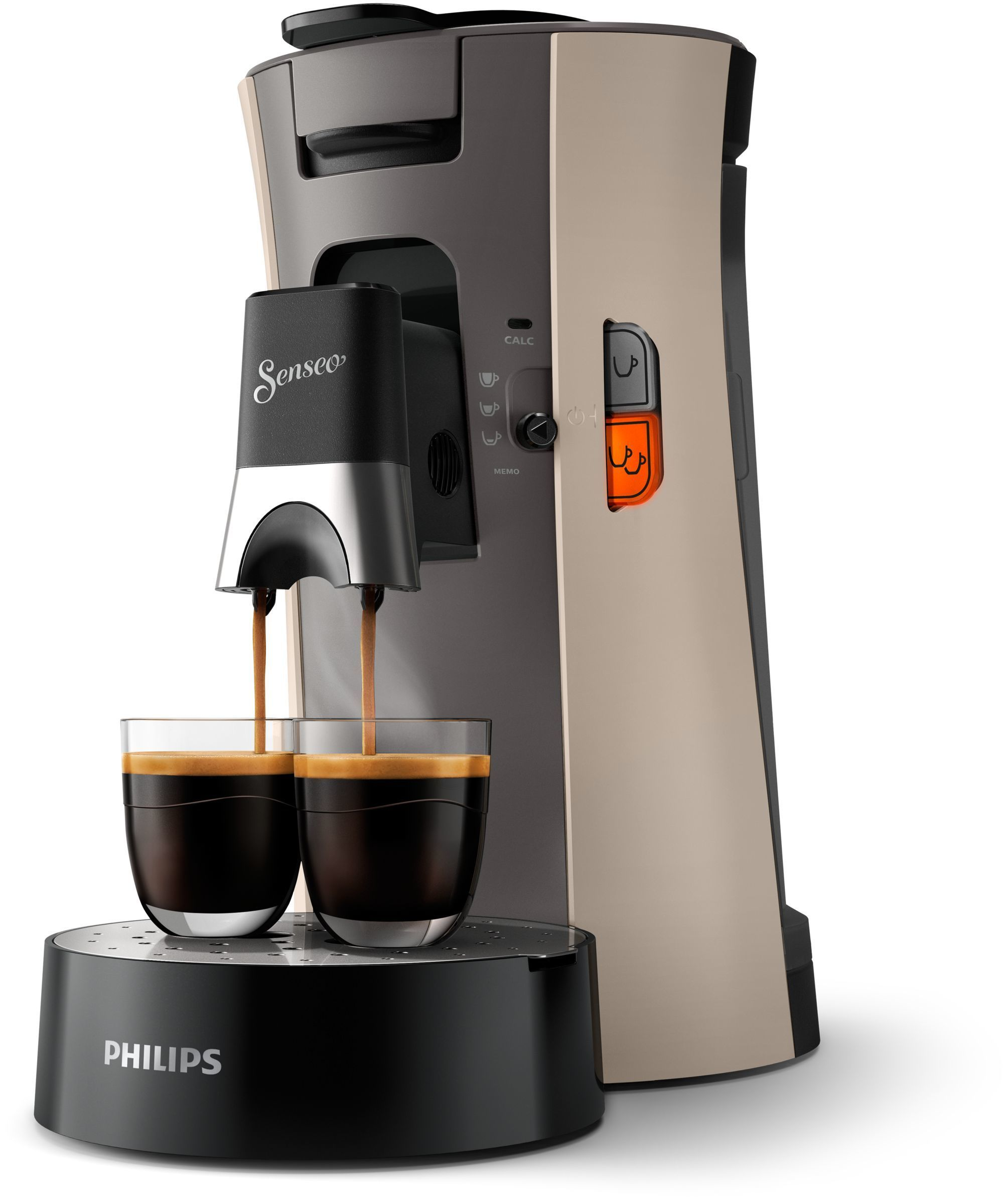 Eine silber-beige Kaffeemaschine gießt zwei Espressos in Gläser.