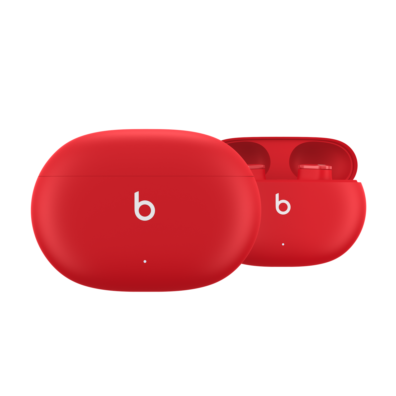 Dos estuches de carga rojos para auriculares Beats. El fondo es negro.