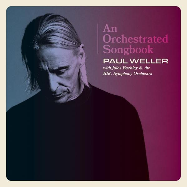 Pochette d'album avec Paul Weller. Texte : An Orchestrated Songbook. Couleurs : violet, bleu, blanc. Dégradé.