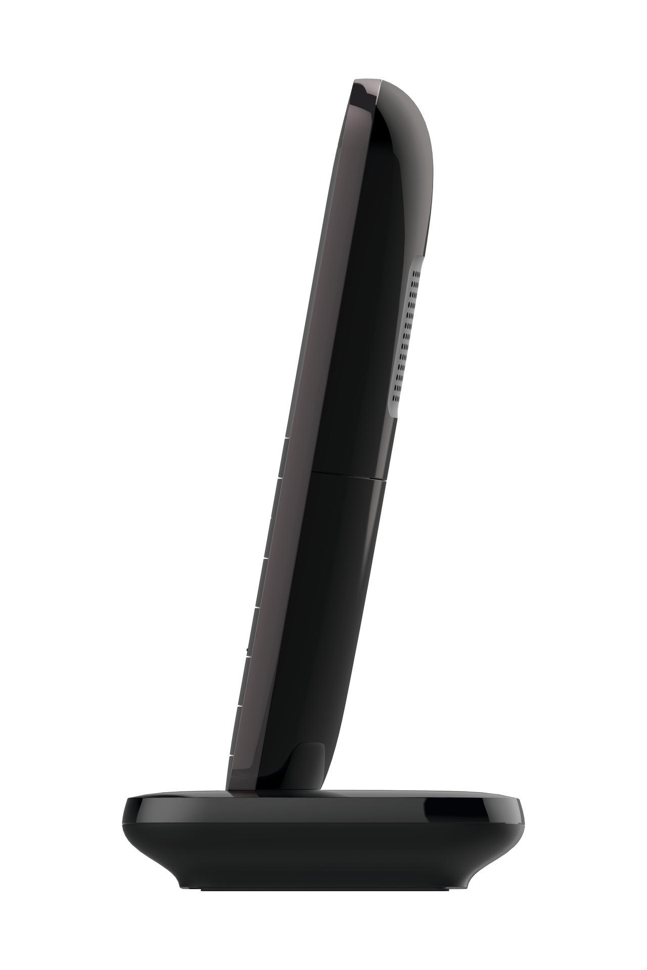 Schwarzes schnurloses Telefon auf schwarzer Ladestation, Seitenansicht.